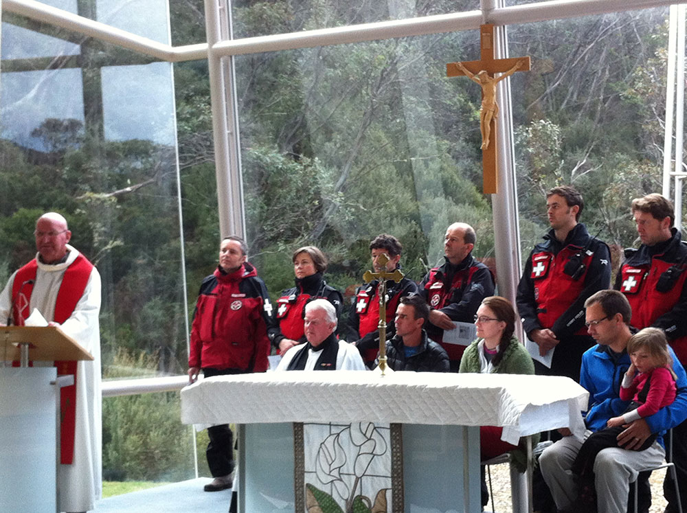 The minister taking the blessing of the snow