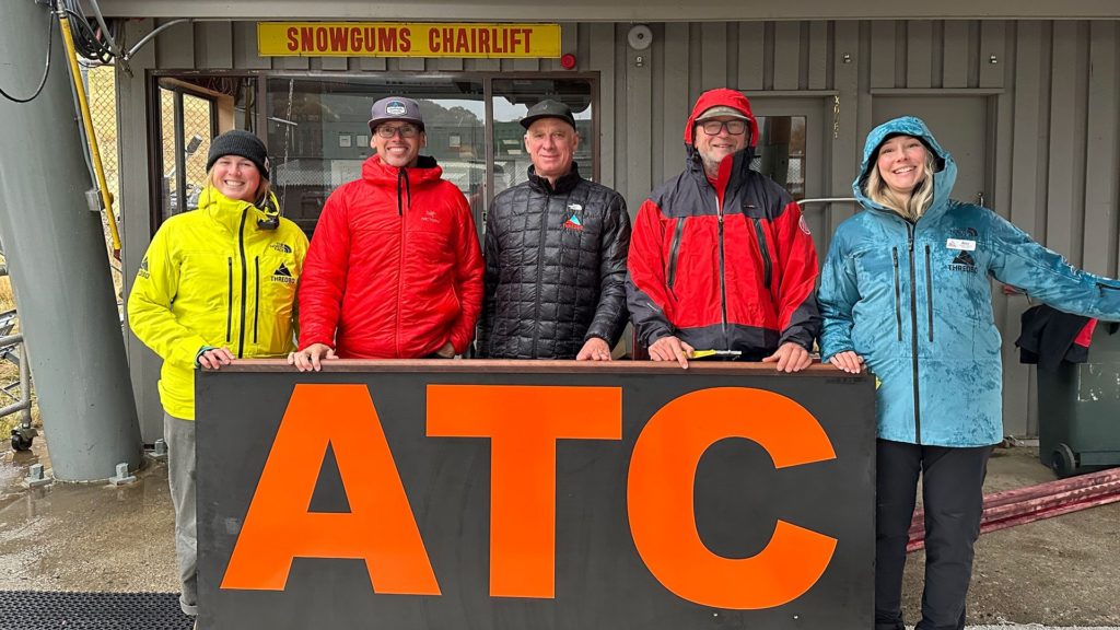 Five Thredbo and MSC representatives stand behind an ATC sign